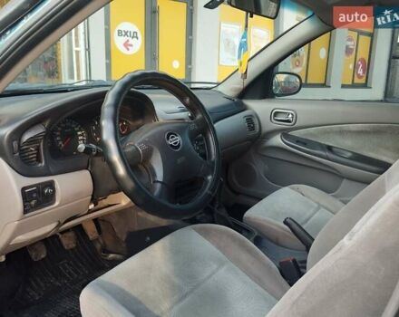 Синий Ниссан Альмера, объемом двигателя 1.5 л и пробегом 335 тыс. км за 3150 $, фото 11 на Automoto.ua