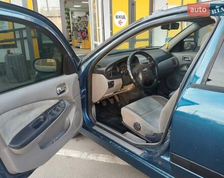 Синий Ниссан Альмера, объемом двигателя 1.5 л и пробегом 335 тыс. км за 3150 $, фото 10 на Automoto.ua