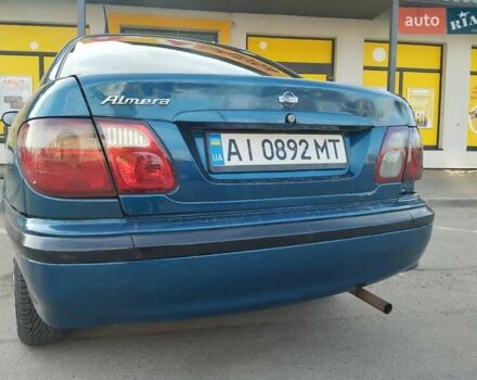 Синий Ниссан Альмера, объемом двигателя 1.5 л и пробегом 335 тыс. км за 3150 $, фото 5 на Automoto.ua