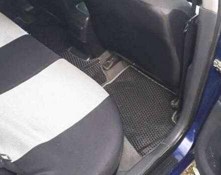 Синий Ниссан Альмера, объемом двигателя 1.5 л и пробегом 319 тыс. км за 3500 $, фото 13 на Automoto.ua