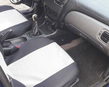 Синий Ниссан Альмера, объемом двигателя 1.5 л и пробегом 319 тыс. км за 3500 $, фото 14 на Automoto.ua