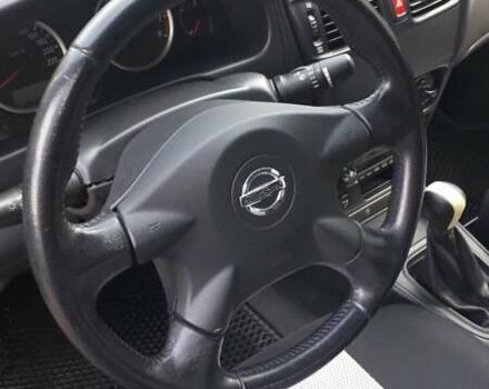 Синий Ниссан Альмера, объемом двигателя 1.5 л и пробегом 319 тыс. км за 3500 $, фото 12 на Automoto.ua