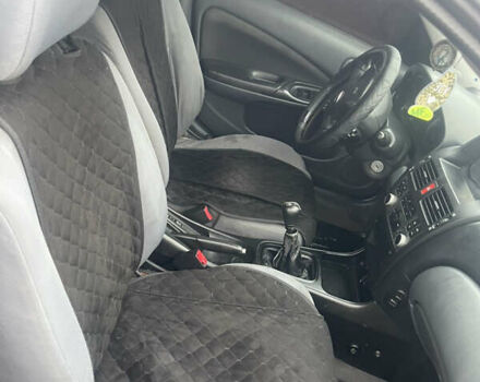 Синий Ниссан Альмера, объемом двигателя 1.5 л и пробегом 220 тыс. км за 2550 $, фото 6 на Automoto.ua