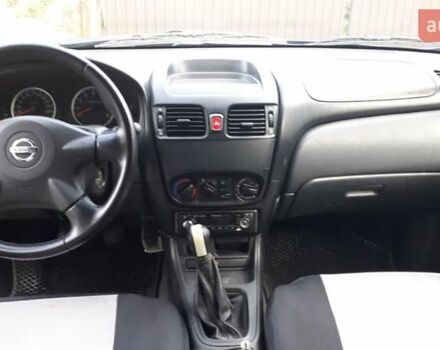 Синий Ниссан Альмера, объемом двигателя 1.5 л и пробегом 319 тыс. км за 3500 $, фото 11 на Automoto.ua