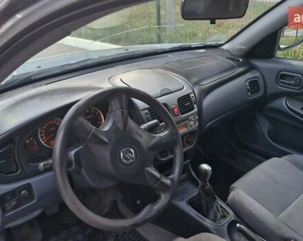 Синий Ниссан Альмера, объемом двигателя 1.8 л и пробегом 290 тыс. км за 2900 $, фото 10 на Automoto.ua