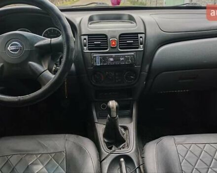 Синій Ніссан Альмера, об'ємом двигуна 1.5 л та пробігом 335 тис. км за 3899 $, фото 9 на Automoto.ua