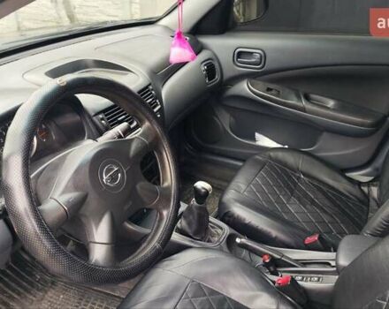 Синій Ніссан Альмера, об'ємом двигуна 1.5 л та пробігом 335 тис. км за 3899 $, фото 8 на Automoto.ua