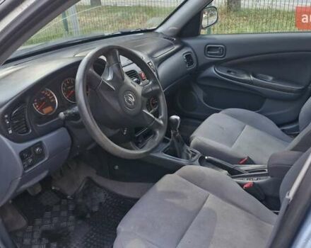 Синий Ниссан Альмера, объемом двигателя 1.8 л и пробегом 290 тыс. км за 2900 $, фото 12 на Automoto.ua