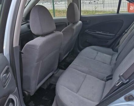 Синий Ниссан Альмера, объемом двигателя 1.8 л и пробегом 290 тыс. км за 2900 $, фото 11 на Automoto.ua