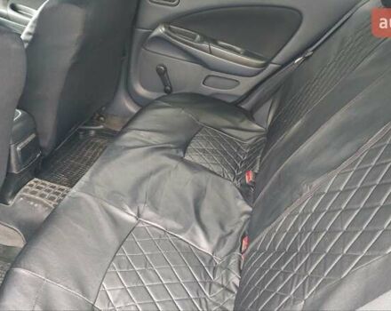 Синій Ніссан Альмера, об'ємом двигуна 1.5 л та пробігом 335 тис. км за 3899 $, фото 10 на Automoto.ua