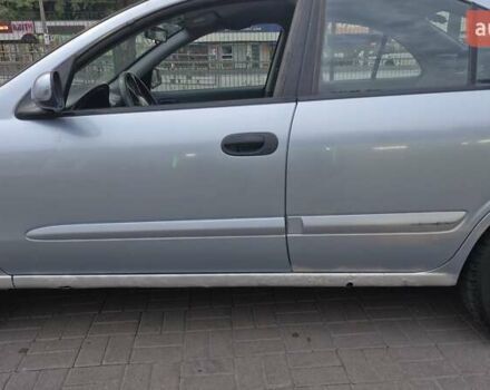 Синий Ниссан Альмера, объемом двигателя 1.8 л и пробегом 290 тыс. км за 2900 $, фото 8 на Automoto.ua