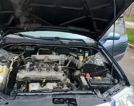 Синий Ниссан Альмера, объемом двигателя 1.6 л и пробегом 280 тыс. км за 3400 $, фото 11 на Automoto.ua
