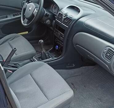 Синий Ниссан Альмера, объемом двигателя 1.6 л и пробегом 213 тыс. км за 4200 $, фото 6 на Automoto.ua