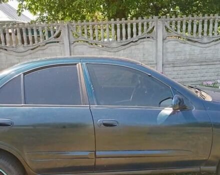 Синий Ниссан Альмера, объемом двигателя 1.6 л и пробегом 310 тыс. км за 3300 $, фото 9 на Automoto.ua