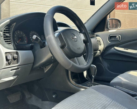 Синій Ніссан Альмера, об'ємом двигуна 1.6 л та пробігом 233 тис. км за 4950 $, фото 10 на Automoto.ua