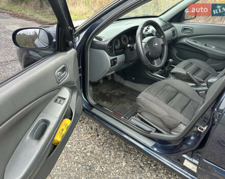 Синий Ниссан Альмера, объемом двигателя 1.6 л и пробегом 236 тыс. км за 5000 $, фото 14 на Automoto.ua