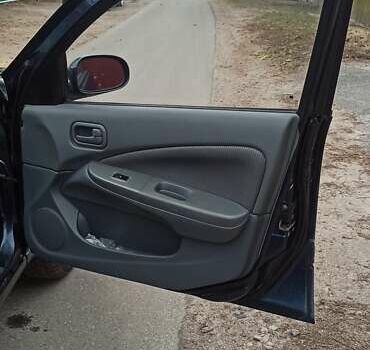 Синий Ниссан Альмера, объемом двигателя 1.6 л и пробегом 213 тыс. км за 4200 $, фото 7 на Automoto.ua