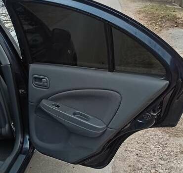 Синий Ниссан Альмера, объемом двигателя 1.6 л и пробегом 213 тыс. км за 4200 $, фото 14 на Automoto.ua