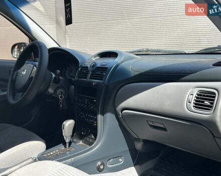 Синій Ніссан Альмера, об'ємом двигуна 1.6 л та пробігом 233 тис. км за 4950 $, фото 5 на Automoto.ua
