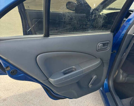 Синій Ніссан Альмера, об'ємом двигуна 1.6 л та пробігом 200 тис. км за 3899 $, фото 13 на Automoto.ua