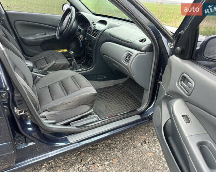 Синий Ниссан Альмера, объемом двигателя 1.6 л и пробегом 236 тыс. км за 5000 $, фото 29 на Automoto.ua