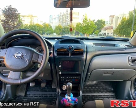 Синий Ниссан Альмера, объемом двигателя 1.6 л и пробегом 280 тыс. км за 4300 $, фото 4 на Automoto.ua