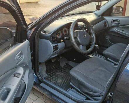 Синій Ніссан Альмера, об'ємом двигуна 1.6 л та пробігом 250 тис. км за 5100 $, фото 6 на Automoto.ua