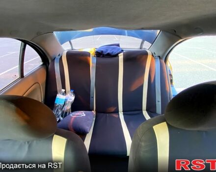 Синий Ниссан Альмера, объемом двигателя 1.6 л и пробегом 280 тыс. км за 4300 $, фото 5 на Automoto.ua