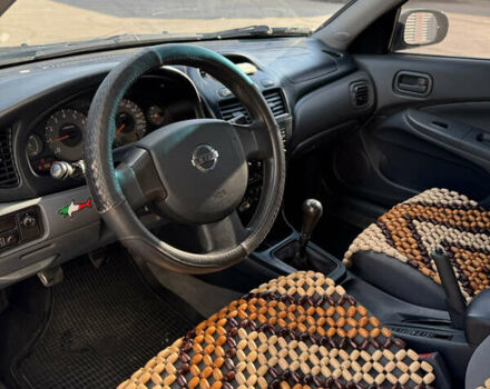 Синий Ниссан Альмера, объемом двигателя 1.6 л и пробегом 174 тыс. км за 3500 $, фото 9 на Automoto.ua