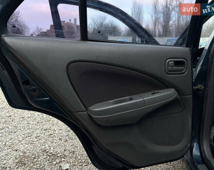 Синій Ніссан Альмера, об'ємом двигуна 1.6 л та пробігом 191 тис. км за 4100 $, фото 15 на Automoto.ua