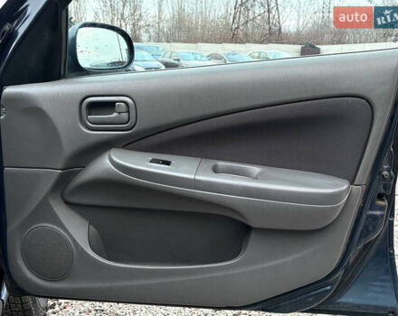 Синій Ніссан Альмера, об'ємом двигуна 1.6 л та пробігом 191 тис. км за 4100 $, фото 20 на Automoto.ua