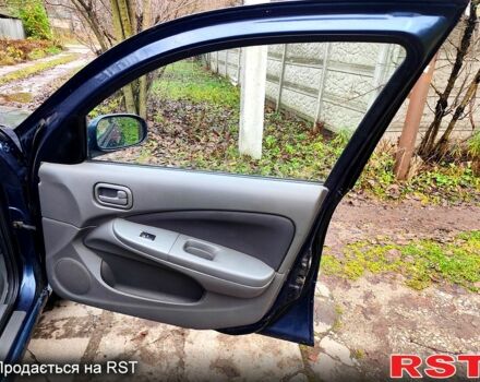 Синий Ниссан Альмера, объемом двигателя 1.6 л и пробегом 191 тыс. км за 4800 $, фото 5 на Automoto.ua