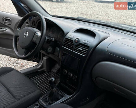 Синій Ніссан Альмера, об'ємом двигуна 1.6 л та пробігом 191 тис. км за 4100 $, фото 19 на Automoto.ua