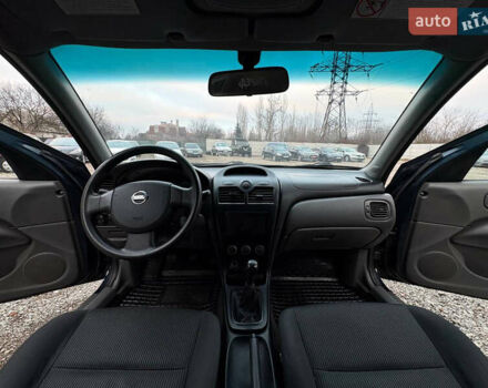 Синій Ніссан Альмера, об'ємом двигуна 1.6 л та пробігом 191 тис. км за 4100 $, фото 13 на Automoto.ua