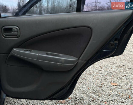 Синій Ніссан Альмера, об'ємом двигуна 1.6 л та пробігом 191 тис. км за 4100 $, фото 17 на Automoto.ua