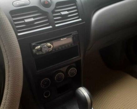 Синий Ниссан Альмера, объемом двигателя 1.6 л и пробегом 110 тыс. км за 6100 $, фото 4 на Automoto.ua