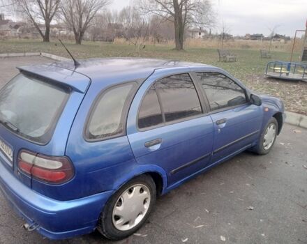 Синий Ниссан Альмера, объемом двигателя 1.4 л и пробегом 323 тыс. км за 1800 $, фото 5 на Automoto.ua