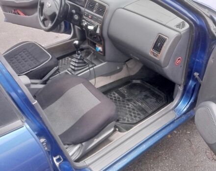 Синий Ниссан Альмера, объемом двигателя 1.4 л и пробегом 323 тыс. км за 1800 $, фото 6 на Automoto.ua