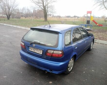 Синий Ниссан Альмера, объемом двигателя 1.4 л и пробегом 323 тыс. км за 1800 $, фото 4 на Automoto.ua