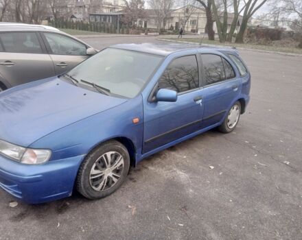 Синий Ниссан Альмера, объемом двигателя 1.4 л и пробегом 323 тыс. км за 1800 $, фото 2 на Automoto.ua
