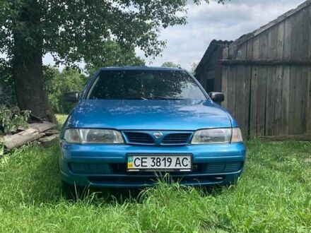 Синий Ниссан Альмера, объемом двигателя 1.4 л и пробегом 246 тыс. км за 1900 $, фото 1 на Automoto.ua