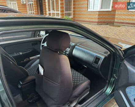 Зеленый Ниссан Альмера, объемом двигателя 1.39 л и пробегом 227 тыс. км за 1900 $, фото 15 на Automoto.ua