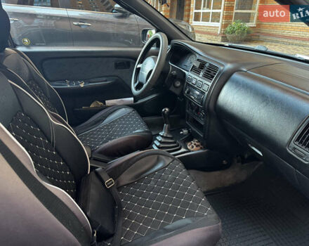 Зеленый Ниссан Альмера, объемом двигателя 1.39 л и пробегом 227 тыс. км за 1900 $, фото 12 на Automoto.ua