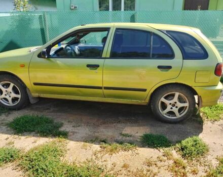 Зелений Ніссан Альмера, об'ємом двигуна 1.4 л та пробігом 150 тис. км за 1800 $, фото 1 на Automoto.ua