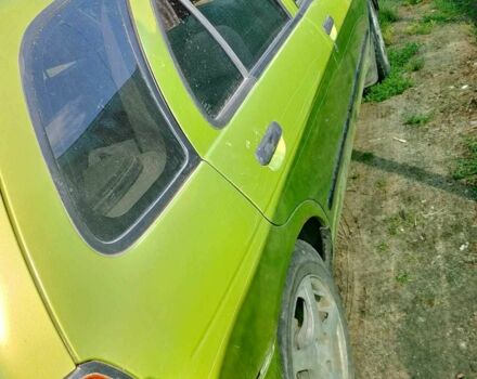 Зелений Ніссан Альмера, об'ємом двигуна 1.4 л та пробігом 150 тис. км за 1800 $, фото 3 на Automoto.ua