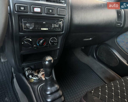 Зеленый Ниссан Альмера, объемом двигателя 1.39 л и пробегом 227 тыс. км за 1900 $, фото 23 на Automoto.ua