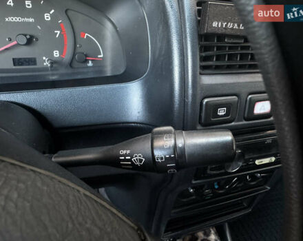 Зеленый Ниссан Альмера, объемом двигателя 1.39 л и пробегом 227 тыс. км за 1900 $, фото 24 на Automoto.ua