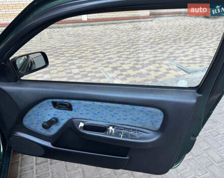 Зеленый Ниссан Альмера, объемом двигателя 1.39 л и пробегом 227 тыс. км за 1900 $, фото 13 на Automoto.ua