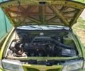 Зелений Ніссан Альмера, об'ємом двигуна 1.4 л та пробігом 150 тис. км за 1800 $, фото 4 на Automoto.ua