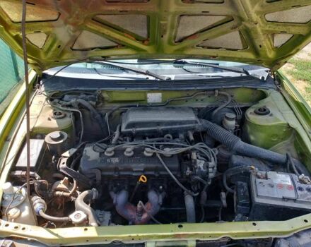 Зеленый Ниссан Альмера, объемом двигателя 1.4 л и пробегом 150 тыс. км за 1200 $, фото 2 на Automoto.ua